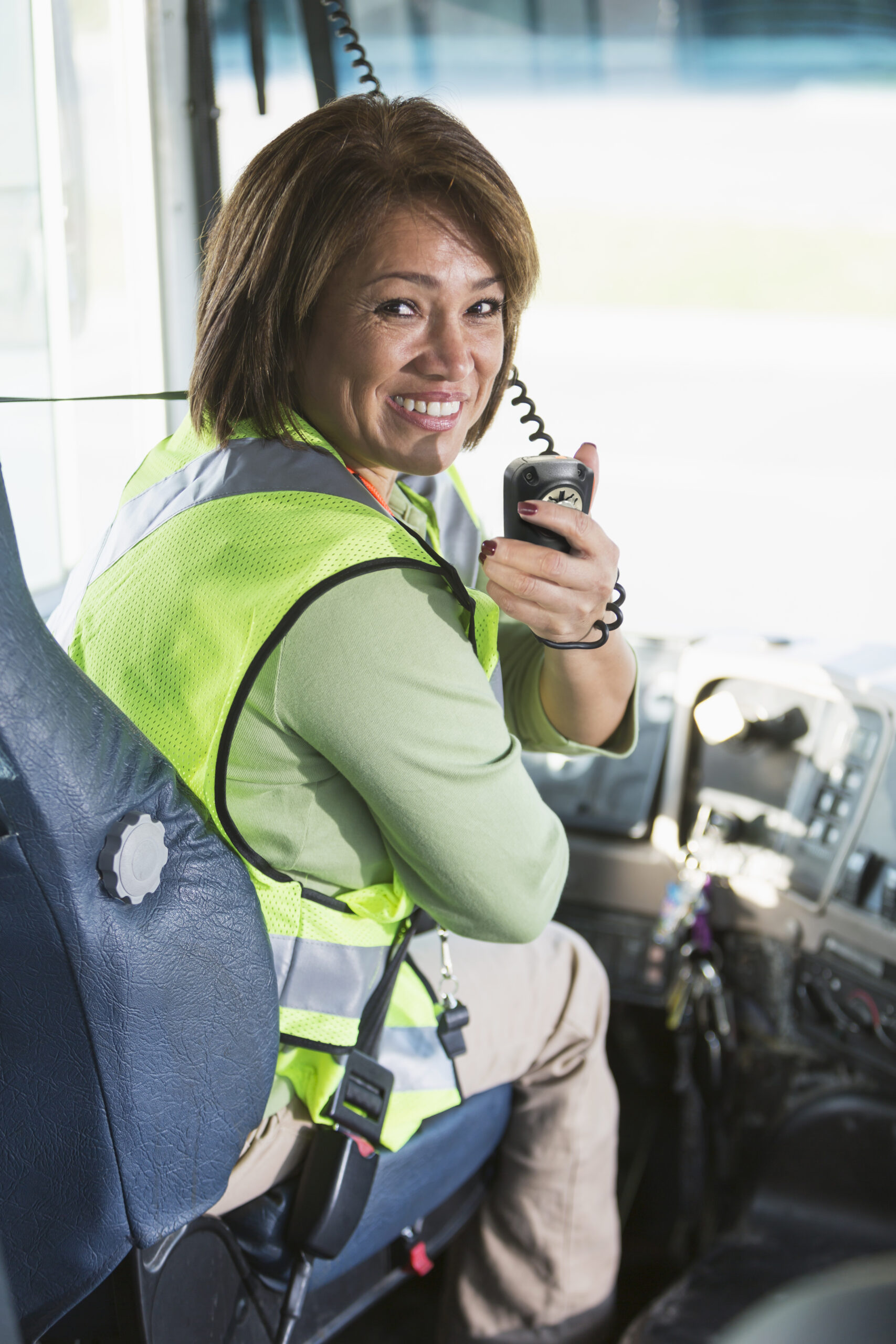 Female bus driver Digital Tier II Radio Systems